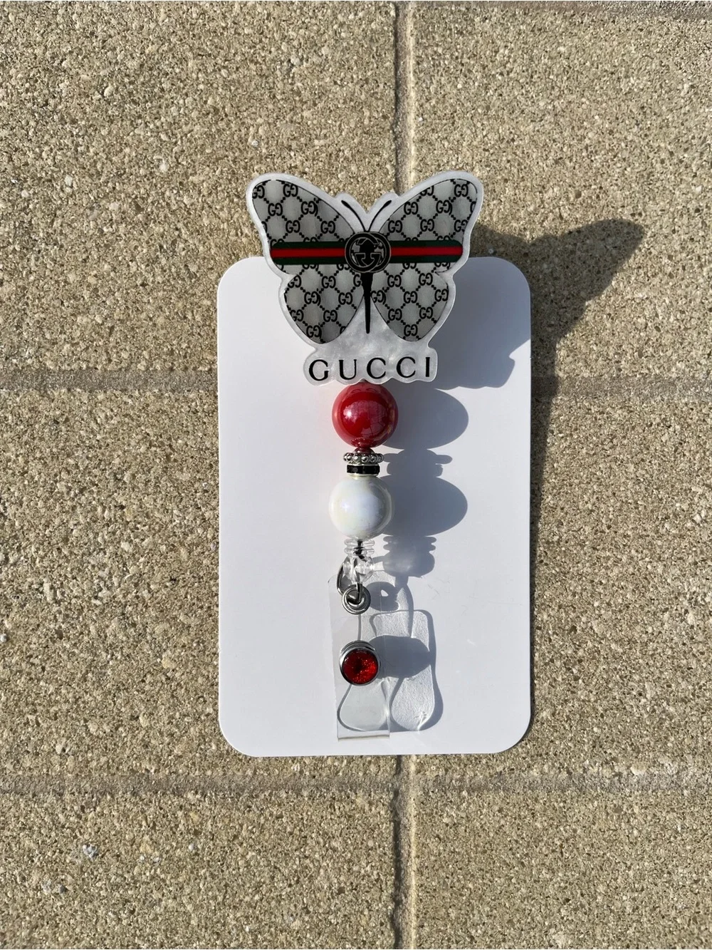 Hand Crafted Inspired White Butterfly Badge Reel with Red and White Beads
